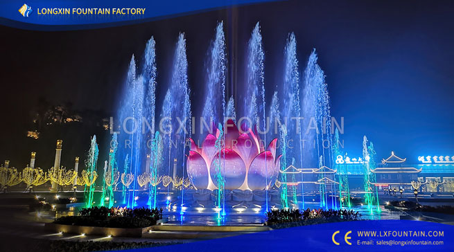 tall outdoor water fountains with lights